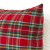 Red tartan pillow cover with gold thread detail.jpg